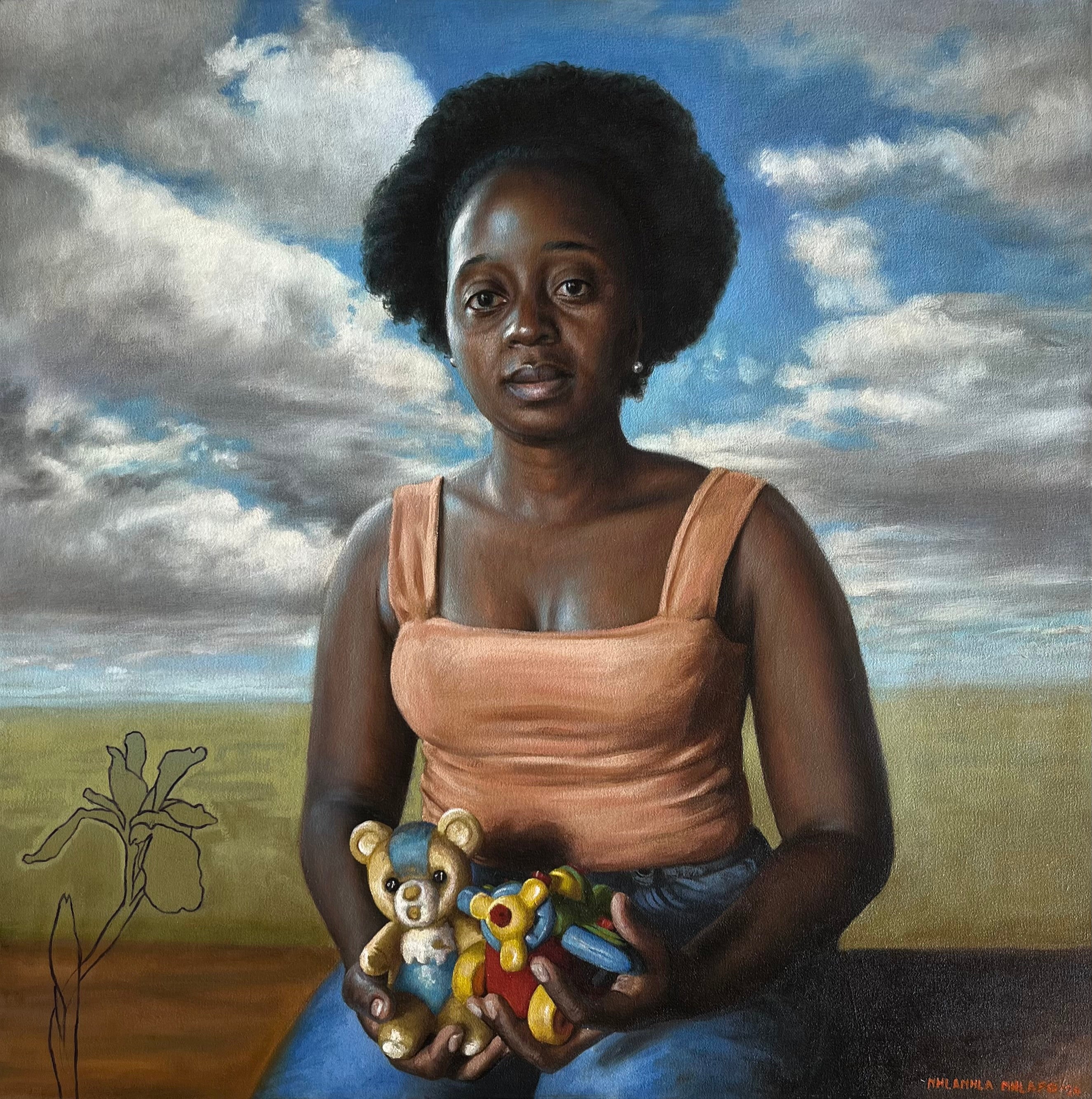 Lerato Holding her Child's Toys