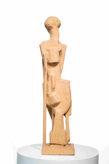 Figure with a walking stick
