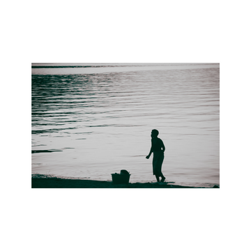 Young girl on the lake
