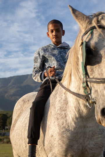 Jordan Bester with Aunty Madam, owned by Utim Palmer. Genadendal
