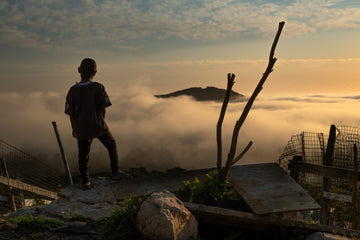 Boy Above a Sea of Fog