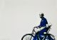 Mary Sibande-Sophie leisurely riding a bicycle